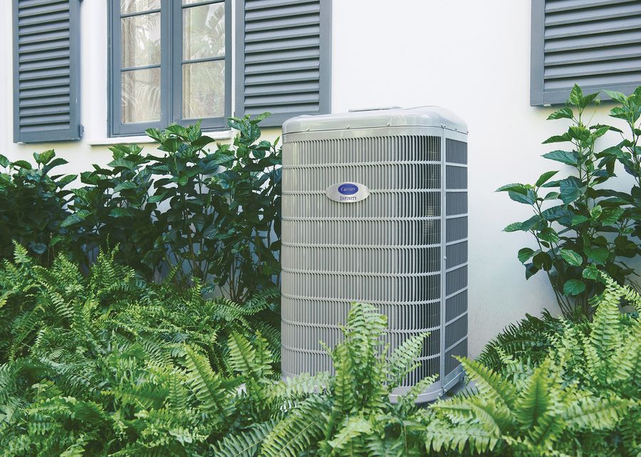 Carrier air conditioner outside a home